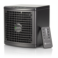 A compact PureAir portable air purifier in black with a front grille and a matching remote control, shown on a clean white background with a subtle reflection.